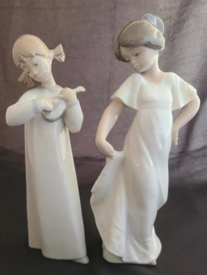 Lladro Statues, "How Pretty!" and "Girl with Guitar" Lladro Porcelain Sculpture - Sold Individually