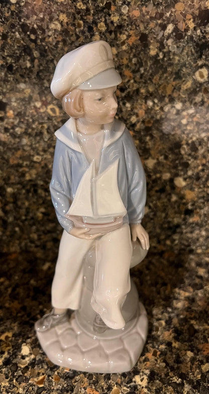 Lladro "Boy with Yacht" Glossy Figurine