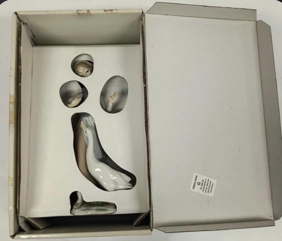 Girl Feeding Duck / Goose Figurine: Lladro - Porcelain Sculpture No. 1052. In original Box