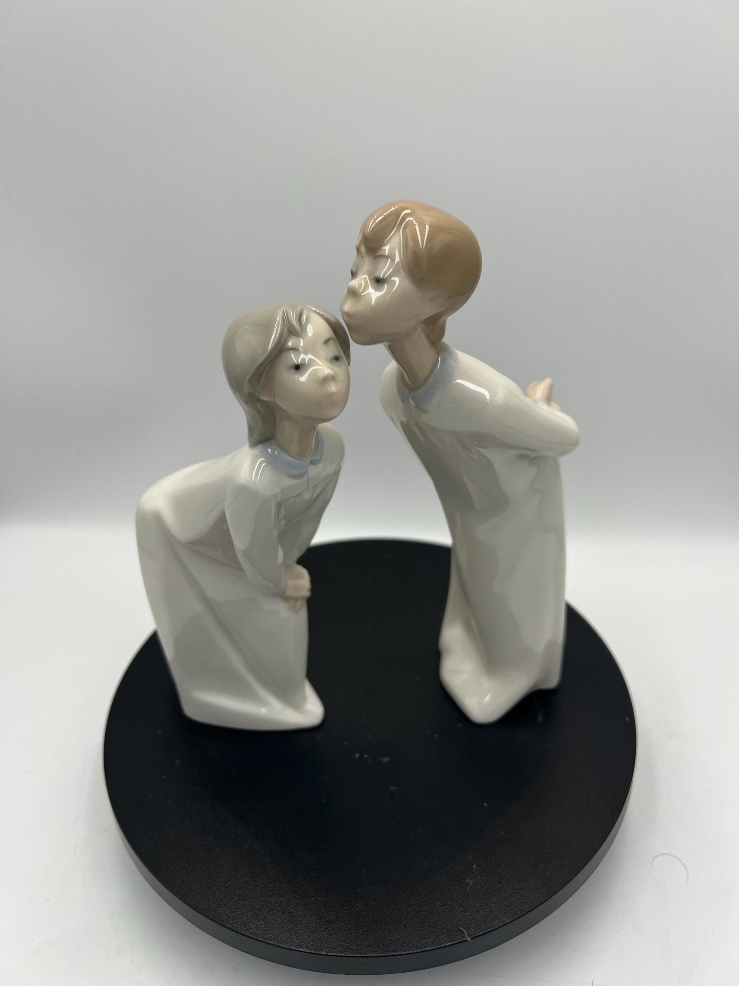 Boy and Girl Kissing, "Kiss Me Goodnight" Lladro Porcelain Sculpture