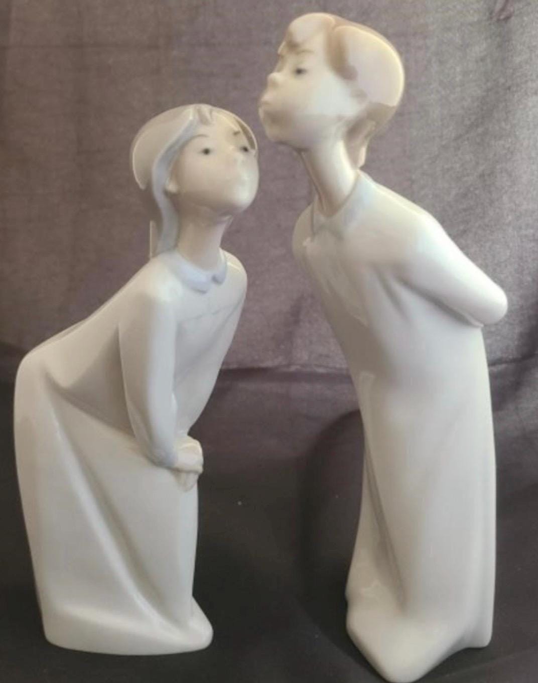 Boy and Girl Kissing, "Kiss Me Goodnight" Lladro Porcelain Sculpture