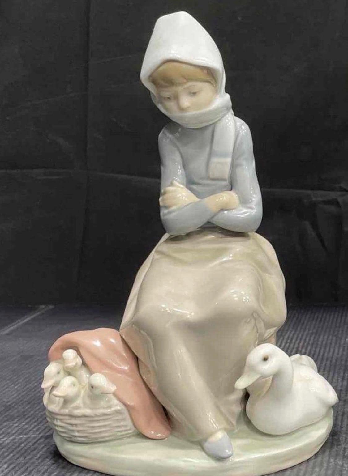 Lladro Statues, "Girl Gathering Flowers" and "Duck Seller" Lladro Porcelain Sculpture - Sold Individually