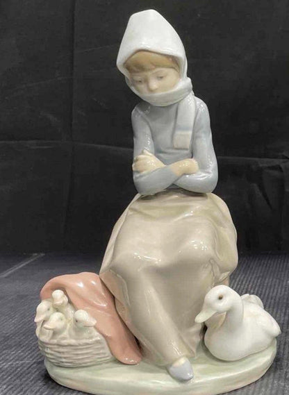 Lladro Statues, "Girl Gathering Flowers" and "Duck Seller" Lladro Porcelain Sculpture - Sold Individually