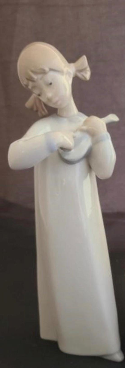 Lladro Statues, "How Pretty!" and "Girl with Guitar" Lladro Porcelain Sculpture - Sold Individually