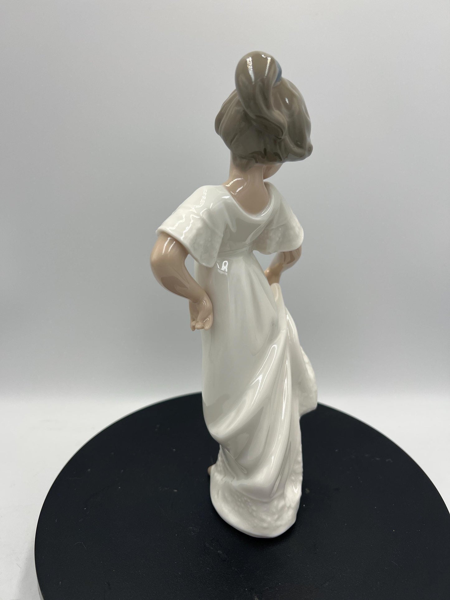 Lladro Statues, "How Pretty!" and "Girl with Guitar" Lladro Porcelain Sculpture - Sold Individually