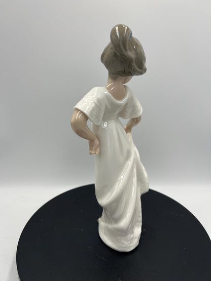 Lladro Statues, "How Pretty!" and "Girl with Guitar" Lladro Porcelain Sculpture - Sold Individually