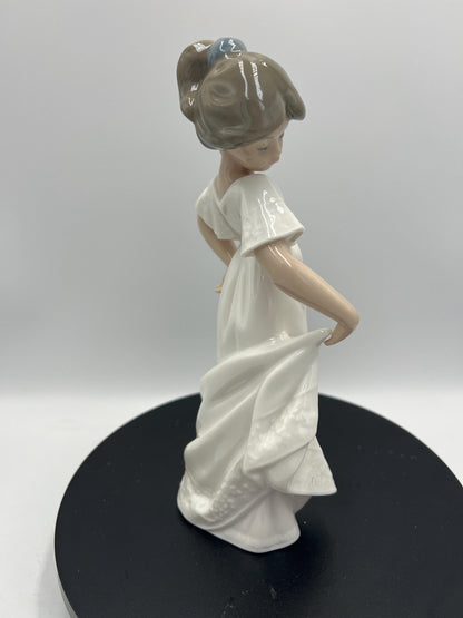 Lladro Statues, "How Pretty!" and "Girl with Guitar" Lladro Porcelain Sculpture - Sold Individually