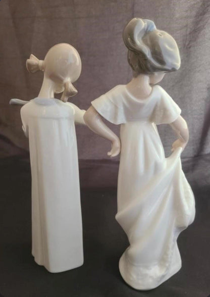 Lladro Statues, "How Pretty!" and "Girl with Guitar" Lladro Porcelain Sculpture - Sold Individually