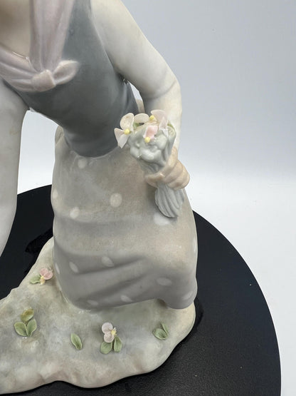 Lladro Statues, "Girl Gathering Flowers" and "Duck Seller" Lladro Porcelain Sculpture - Sold Individually