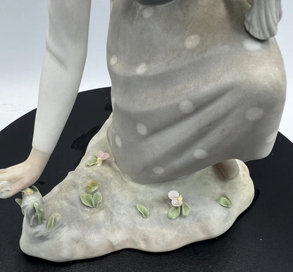 Lladro Statues, "Girl Gathering Flowers" and "Duck Seller" Lladro Porcelain Sculpture - Sold Individually