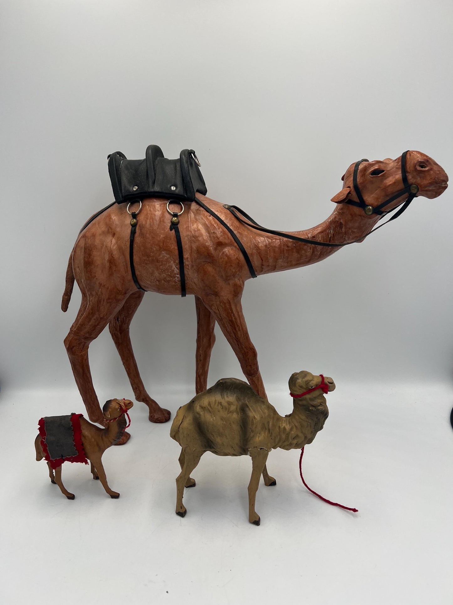 Vintage Dromedary Leather Wrapped Standing Camel Figure Statue 14" Tall W/Saddle and 2 Smaller Camels