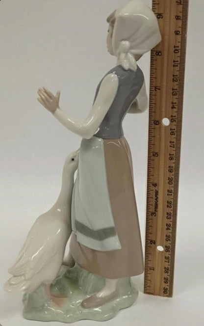 Girl Feeding Duck / Goose Figurine: Lladro - Porcelain Sculpture No. 1052. In original Box