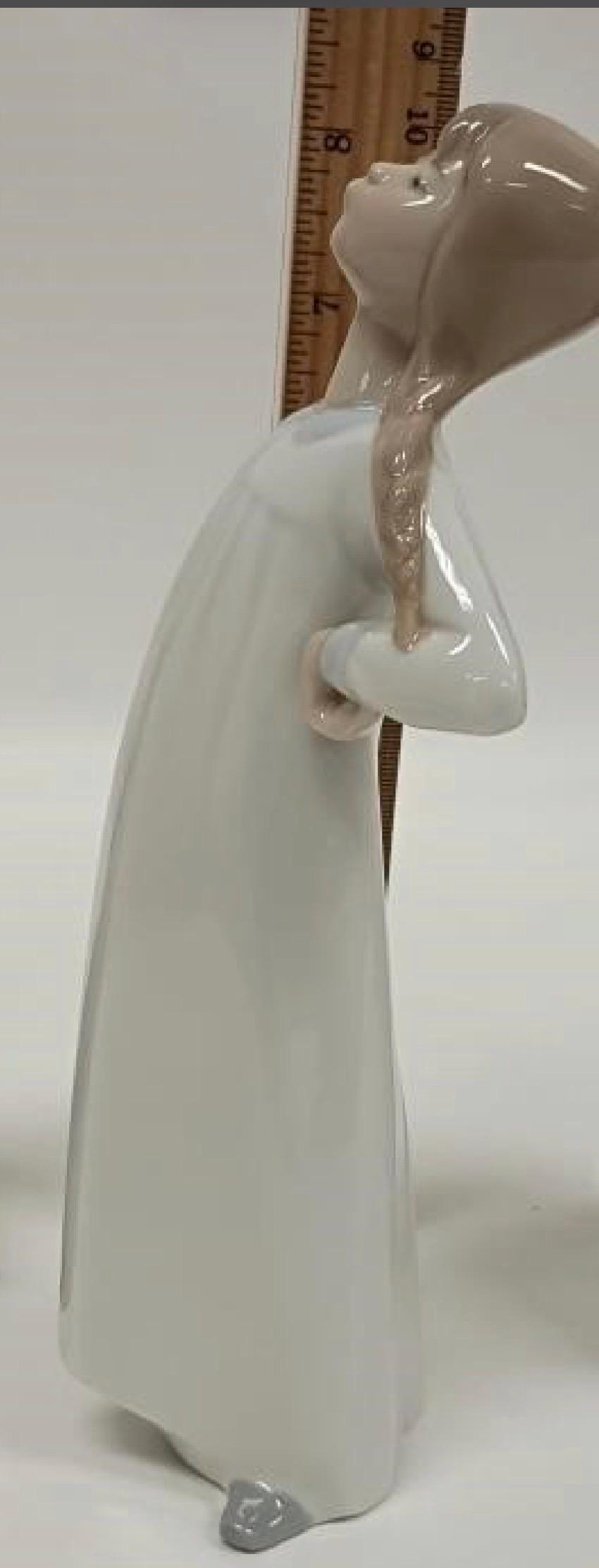 Girl with Hands Akimbo Figurine: Lladro - Porcelain Sculpture No. 4872. In Original Box