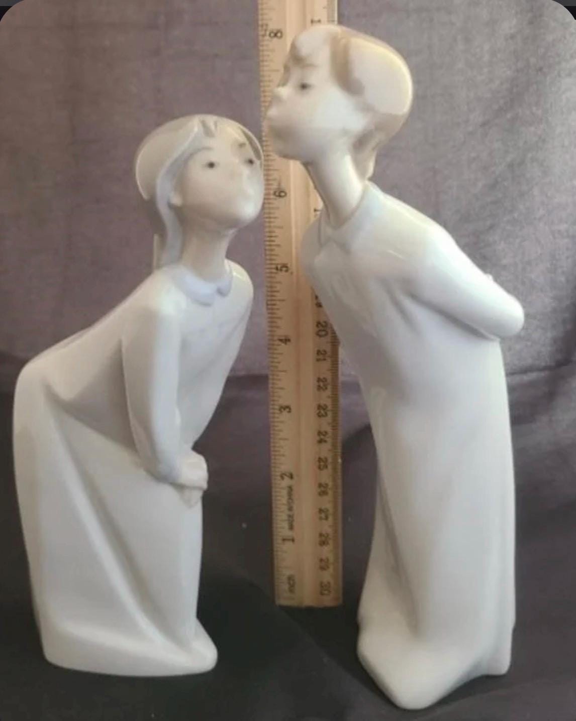 Boy and Girl Kissing, "Kiss Me Goodnight" Lladro Porcelain Sculpture
