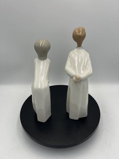 Boy and Girl Kissing, "Kiss Me Goodnight" Lladro Porcelain Sculpture
