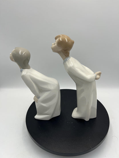 Boy and Girl Kissing, "Kiss Me Goodnight" Lladro Porcelain Sculpture