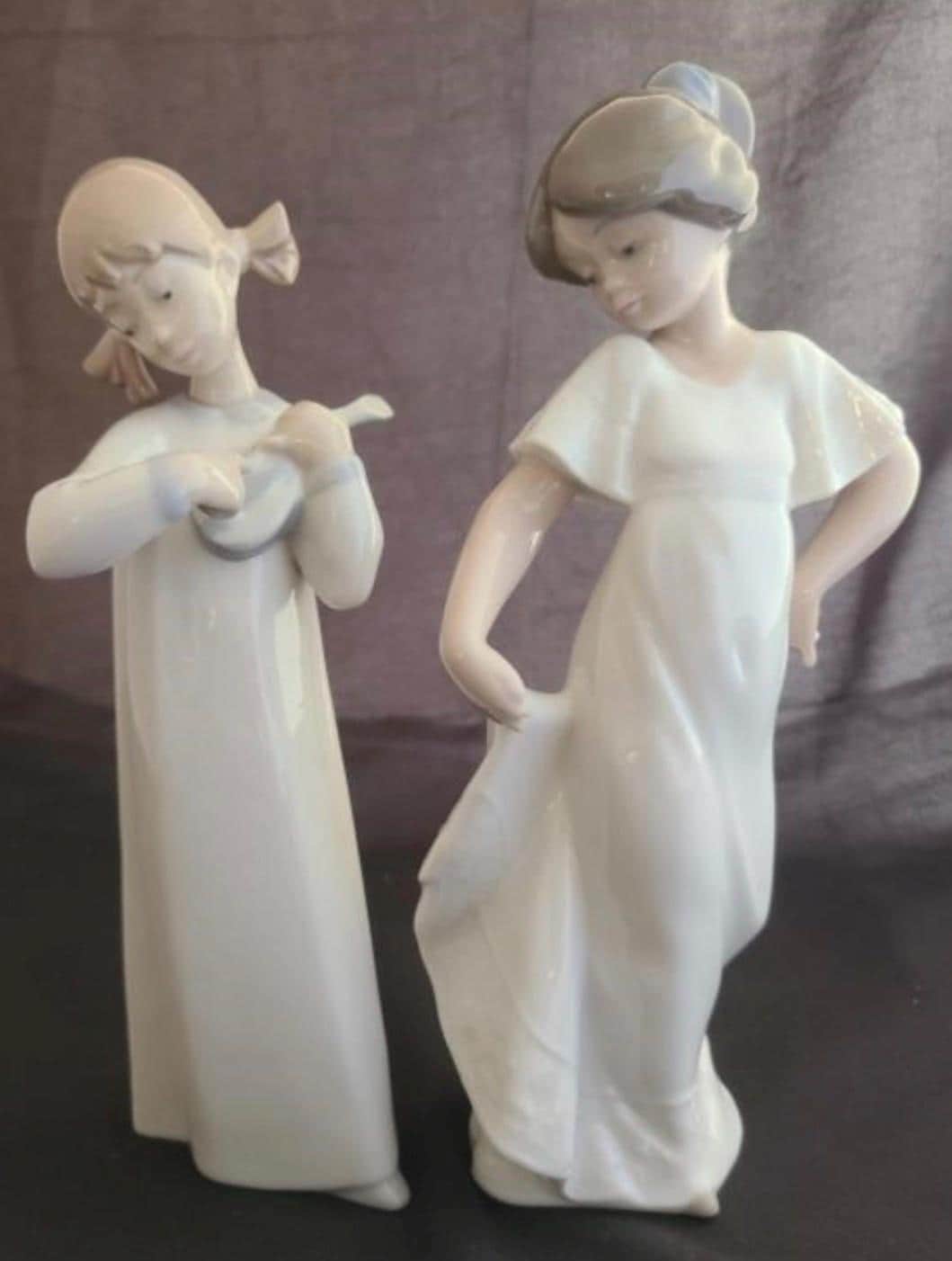 Lladro Statues, "How Pretty!" and "Girl with Guitar" Lladro Porcelain Sculpture - Sold Individually
