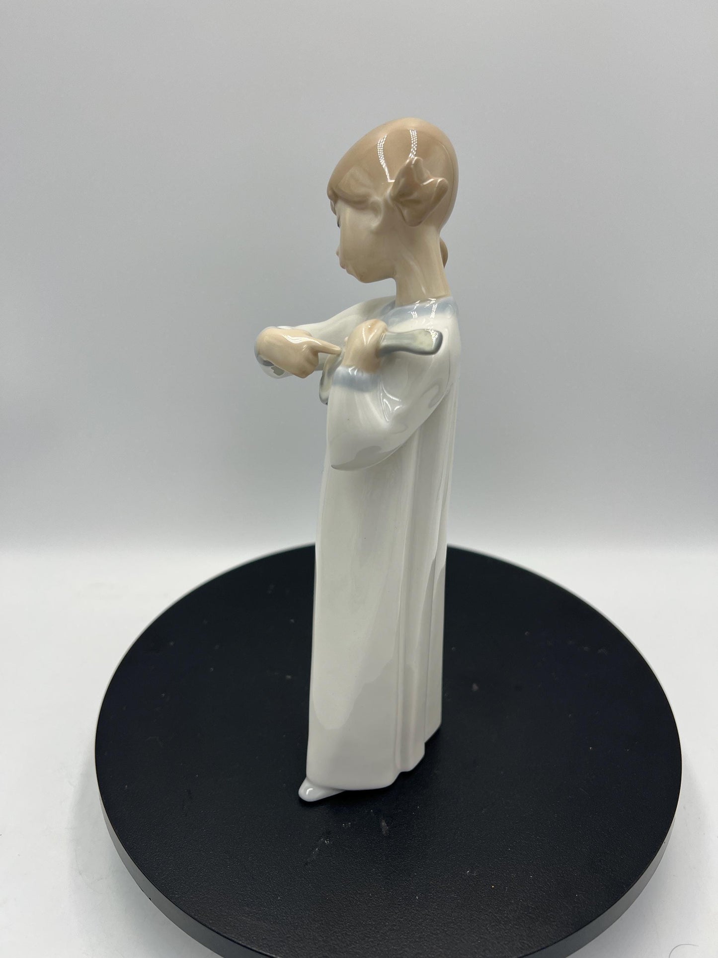 Lladro Statues, "How Pretty!" and "Girl with Guitar" Lladro Porcelain Sculpture - Sold Individually