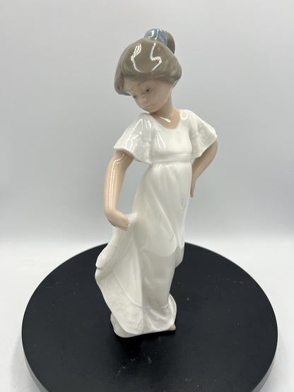 Lladro Statues, "How Pretty!" and "Girl with Guitar" Lladro Porcelain Sculpture - Sold Individually