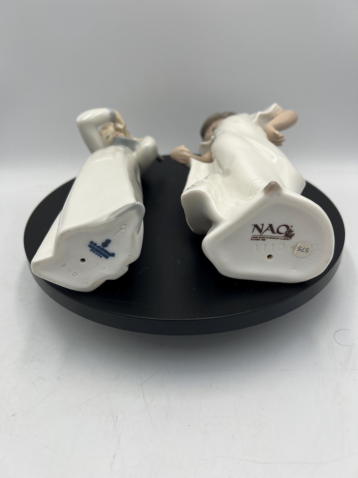Lladro Statues, "How Pretty!" and "Girl with Guitar" Lladro Porcelain Sculpture - Sold Individually