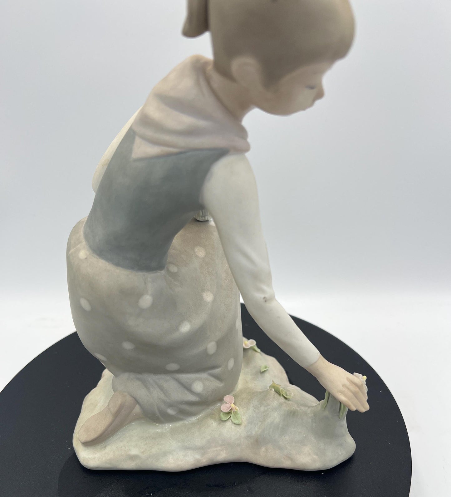 Lladro Statues, "Girl Gathering Flowers" and "Duck Seller" Lladro Porcelain Sculpture - Sold Individually