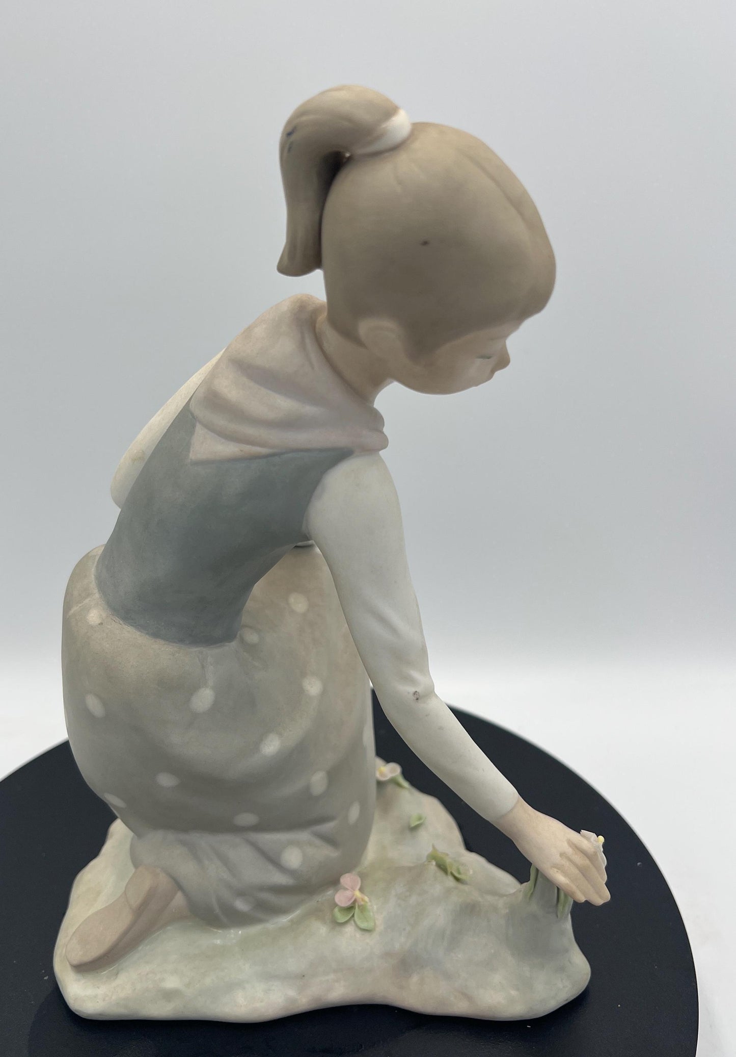 Lladro Statues, "Girl Gathering Flowers" and "Duck Seller" Lladro Porcelain Sculpture - Sold Individually