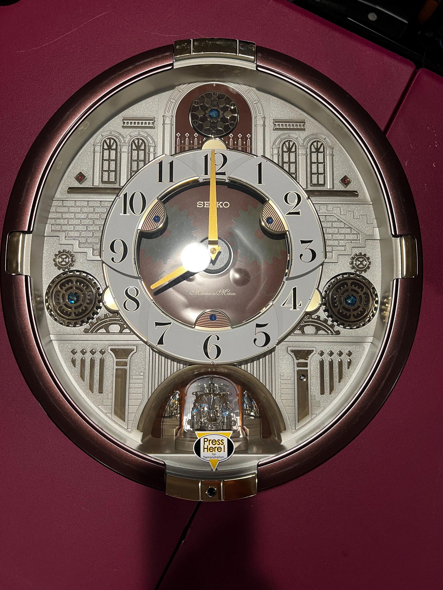 Seiko Melodies in Motion Wall Clock QXM377BRH Animated Musical Clock 30 Melodies Rotating Pendulum Light Sensor