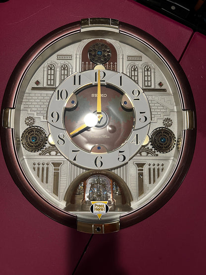 Seiko Melodies in Motion Wall Clock QXM377BRH Animated Musical Clock 30 Melodies Rotating Pendulum Light Sensor